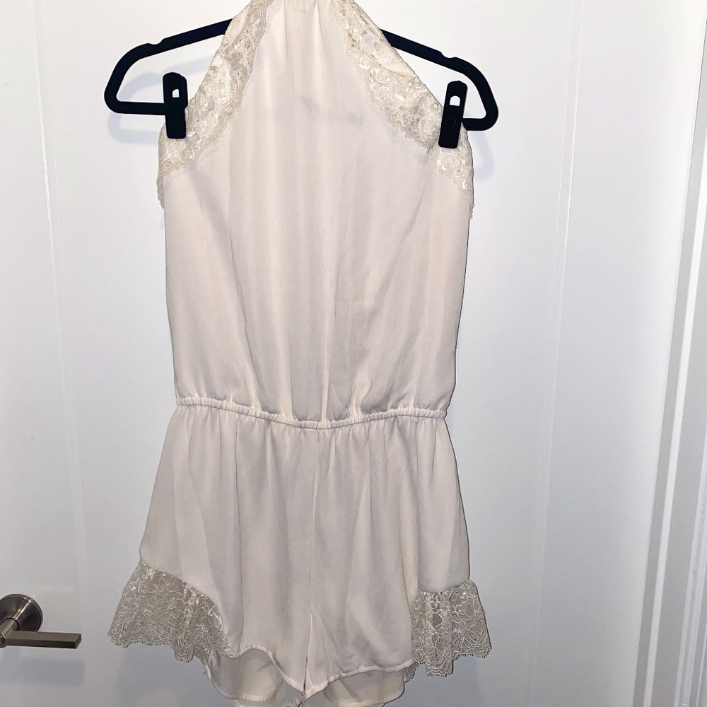 White romper with lace detailing